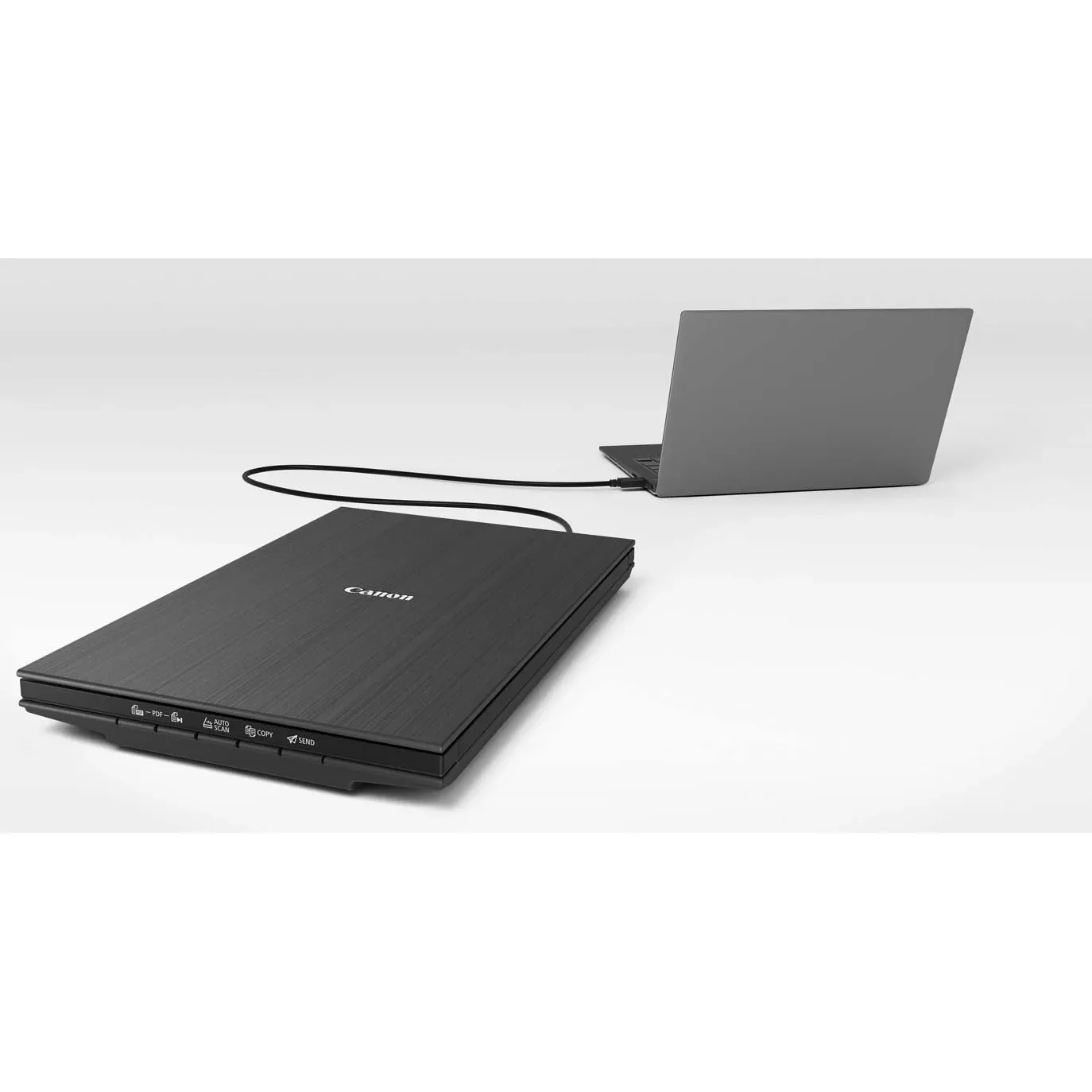 USB Type-C cable connecting the Canon CanoScan LiDE 400 scanner to a laptop