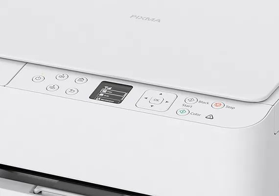 Demonstration of paper cassette loading and photo feeding on Canon PIXMA TS5570 inkjet printer.