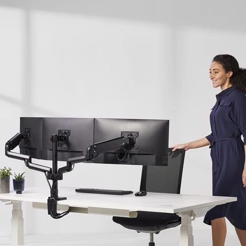 Three-monitor workstation using the Fellowes Platinum Series triple monitor arm