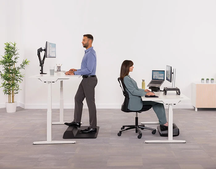 Fellowes Levado silver desk base in an adjustable office workstation